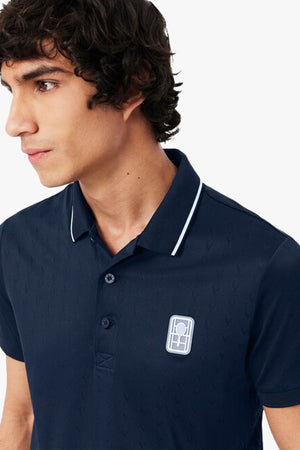 HERITAGE ULTRA-DRY BADGE ACCENT TENNIS POLO